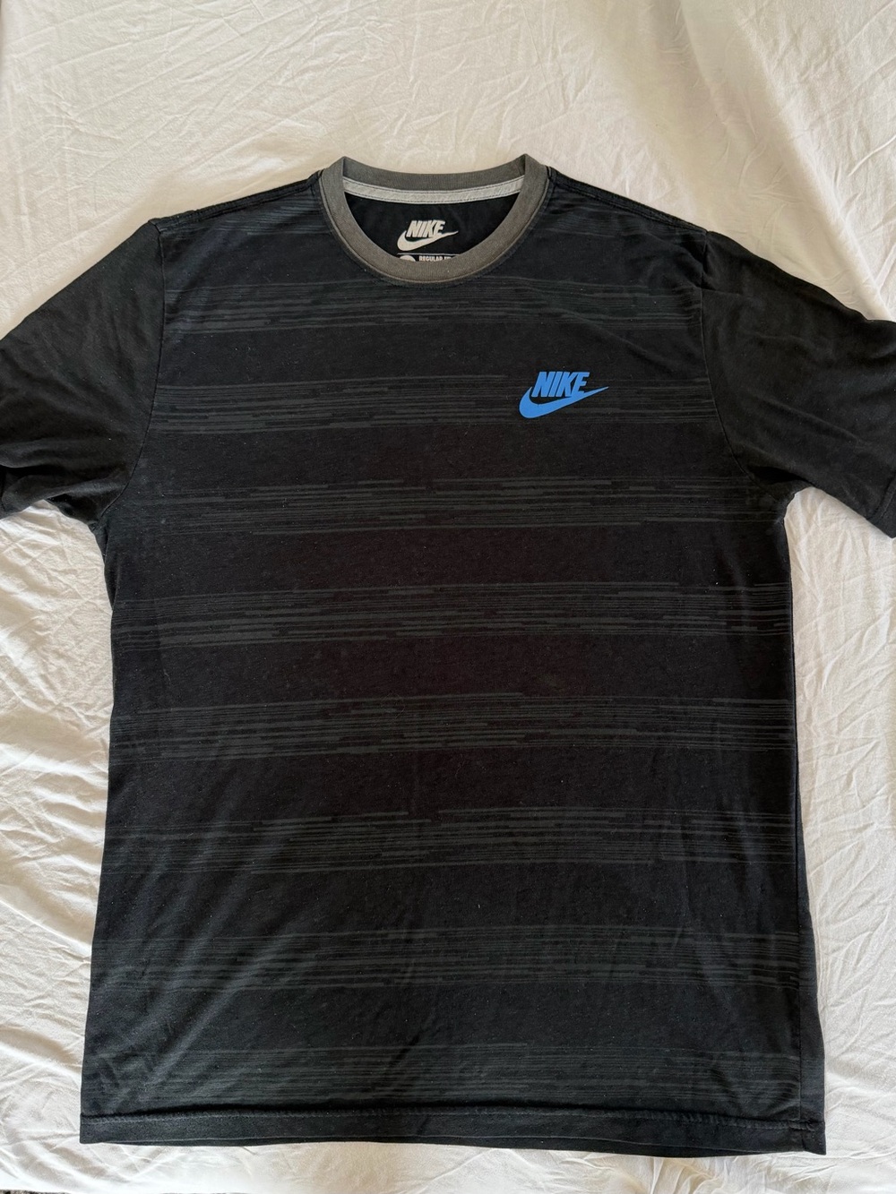 Nike Men’s Black Short-Sleeve Tee with Blue Swoosh